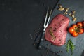 Fresh raw meat beef steak with ingredients for cooking Royalty Free Stock Photo