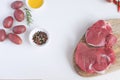 Fresh raw meat beef steak olive oil Spices Pepper Rosemary Raw potato Royalty Free Stock Photo