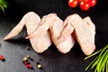 Fresh and raw meat. Chicken wings white ready to cook. Background black blackboard Royalty Free Stock Photo