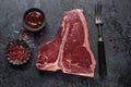 Fresh raw meat steak on dark blue background Royalty Free Stock Photo