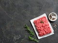 Raw minced beef on light gray cement background Royalty Free Stock Photo