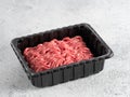 Raw minced beef on light gray cement background Royalty Free Stock Photo