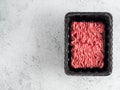 Raw minced beef on light gray cement background Royalty Free Stock Photo