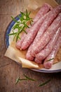 Fresh raw minced meat sausages Royalty Free Stock Photo