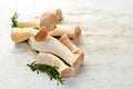 Fresh raw mushrooms, king oyster or eringi on white wooden background background. Mushrooms. Royalty Free Stock Photo