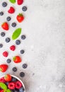 Fresh raw organic berries isolated in white ceramic bowl plate on kitchen table background. Space for text. Top view. Strawberry, Royalty Free Stock Photo