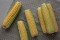 Fresh Raw Organic Corn on the Cob in the Husk, top view Royalty Free Stock Photo