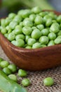 Fresh raw organic green peas Royalty Free Stock Photo