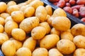 Fresh raw organic uncooked potatoes vegetables for sale at farmers market. Vegan food and healthy nutrition concept. Top view Royalty Free Stock Photo