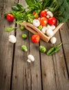 Fresh raw organic vegetables on a rustic wooden table in basket: spinach, broccoli, Brussels Royalty Free Stock Photo