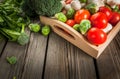 Fresh raw organic vegetables on a rustic wooden table in basket: spinach, broccoli, Brussels Royalty Free Stock Photo