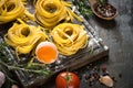 Fresh raw pasta tagliatelle and ingredients Royalty Free Stock Photo