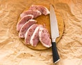 Fresh raw pork chops on a cutting board. Arrangement on the wr Royalty Free Stock Photo