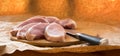 Fresh raw pork chops on a cutting board. Arrangement on the wr Royalty Free Stock Photo