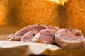 Fresh raw pork chops on a cutting board. Arrangement on the wr Royalty Free Stock Photo