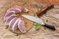 Fresh raw pork chops on a cutting board  on the wrapping paper Royalty Free Stock Photo