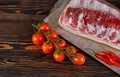 Fresh raw pork delicious salted lard with on wooden cutting board Royalty Free Stock Photo