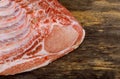 Fresh raw pork loin with ribs on wooden board Royalty Free Stock Photo