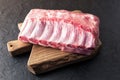 Fresh raw pork piece on wooden board Royalty Free Stock Photo