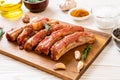 Fresh raw pork ribs ready for roasting with ingredients Royalty Free Stock Photo