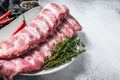 Fresh raw pork ribs with spices and herbs. Gray background. Top view. Copy space Royalty Free Stock Photo