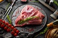 Fresh raw pork shoulder with ingredients and spices on kitchen background. Meat. Top view. Rustic style Royalty Free Stock Photo