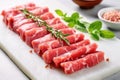 fresh raw pork skewers on a chilled marble slab Royalty Free Stock Photo