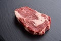 Fresh raw Prime Black Angus beef steak on stone background Royalty Free Stock Photo