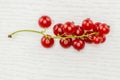 Fresh raw red currant berry on grey wood Royalty Free Stock Photo