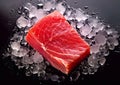 Fresh raw red tuna slice with melted ice on black stone board.Macro.AI generative Royalty Free Stock Photo