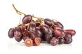 Fresh raw red wine grapes isolated on white Royalty Free Stock Photo