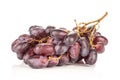 Fresh raw red wine grapes isolated on white Royalty Free Stock Photo