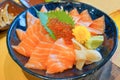 fresh raw salmon with salmon eggs or Ikura and wasabi on topped rice bowl donburi Royalty Free Stock Photo