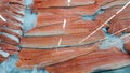 Fresh raw salmon fillet on ice on the counter in a fish store. red fish fillets in the glass refrigerator is sold in the Royalty Free Stock Photo