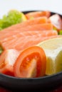 Fresh raw salmon fish pieces on plate isolated Royalty Free Stock Photo