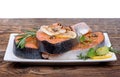 Fresh raw salmon red fish steak with herbs, spices Royalty Free Stock Photo