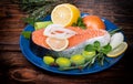 Fresh raw salmon red fish steak with herbs, spices Royalty Free Stock Photo