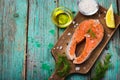 Fresh raw salmon steak with herbs Royalty Free Stock Photo