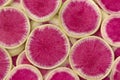 Fresh raw slices watermelon radish close up full frame