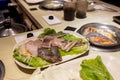 Fresh raw squid and other seafood on the table in a Taiwanese shabu shabu restaurant Royalty Free Stock Photo