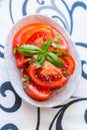 Fresh and raw tomato salad Royalty Free Stock Photo