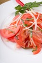 Fresh raw tomato salad served with onion Royalty Free Stock Photo