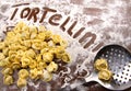 Fresh, raw tortellini with flour Royalty Free Stock Photo