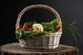 Fresh raw vegetables in a basket.
