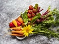 Fresh raw vegetables cherry tomatoes, bell peppers, carrots, beets, okra sunflower. Top view