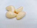 Fresh raw whole peeled garlic cloves organic lehsun ajo alho closeup view image photo selective focus Royalty Free Stock Photo