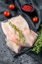 Fresh raw whole squid. Black background. Top view Royalty Free Stock Photo