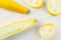 Fresh Raw yellow zucchini on grey wood Royalty Free Stock Photo