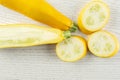 Fresh Raw yellow zucchini on grey wood Royalty Free Stock Photo