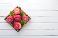 Fresh red apples in a wooden box. Organic food. On a white wooden background. Royalty Free Stock Photo